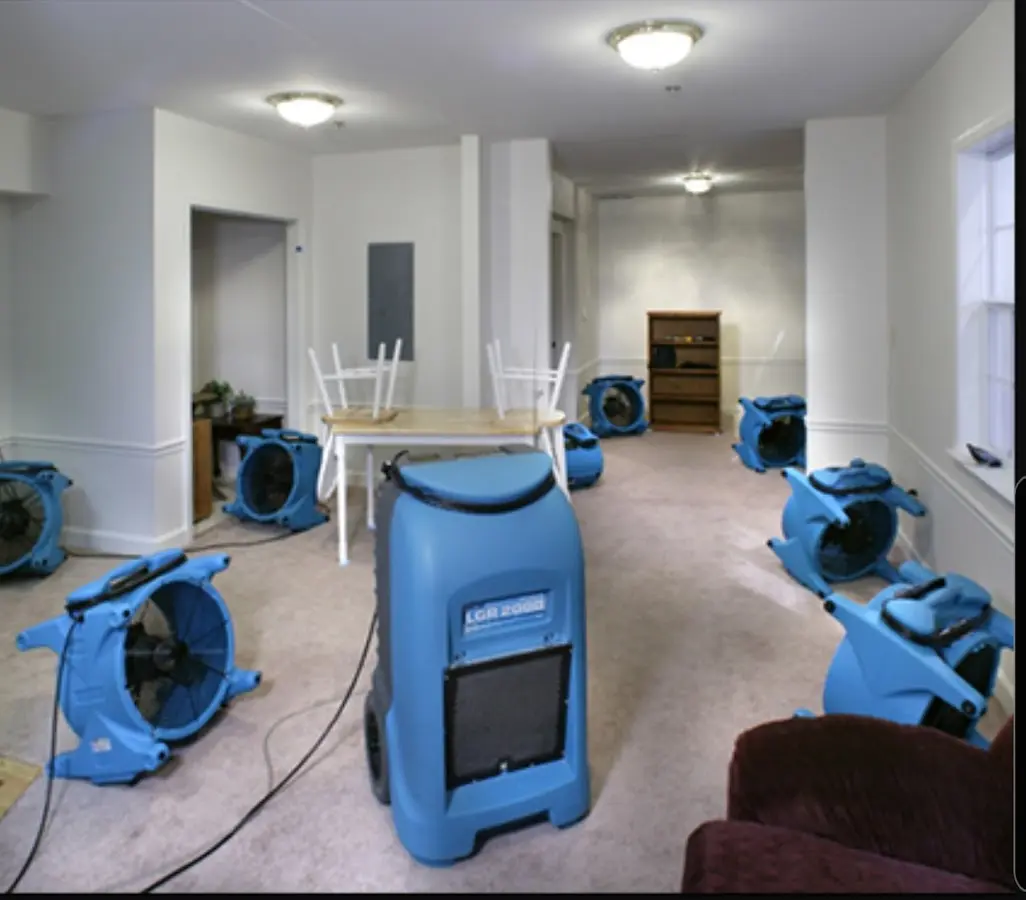 Air movers and dehumidifier setup for Water Extraction & Removal in Conley